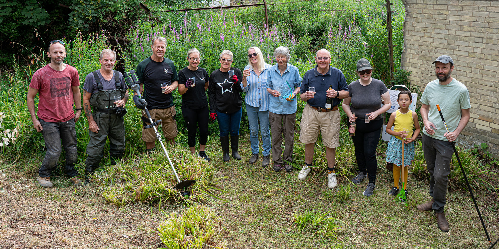 Champagne celebration at Swan Lane tidy-up following award win